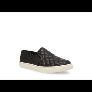 Black Steve Madden slip ons